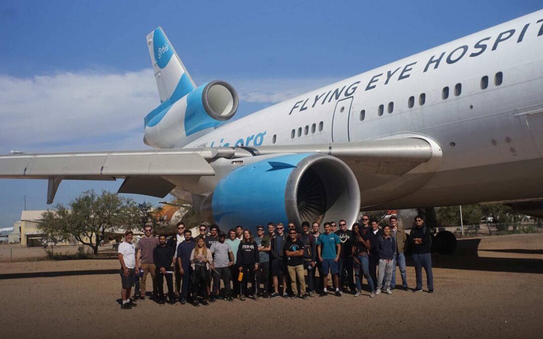 AIAA@ASU field trip to Pima Air Museum. Students in front of large airplane