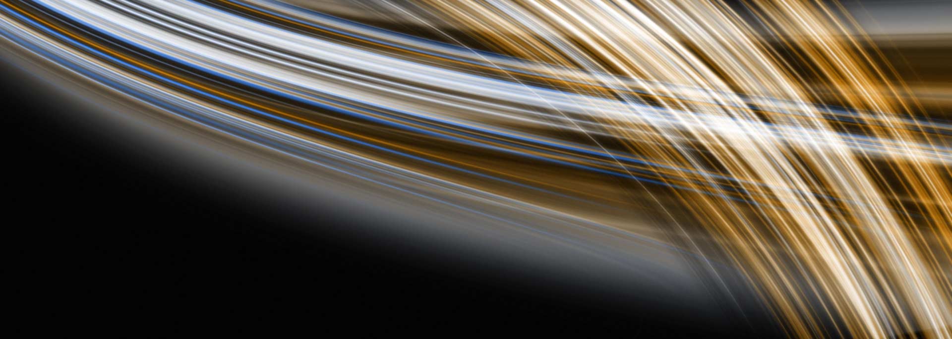 Background image with gray and gold wispy lines.