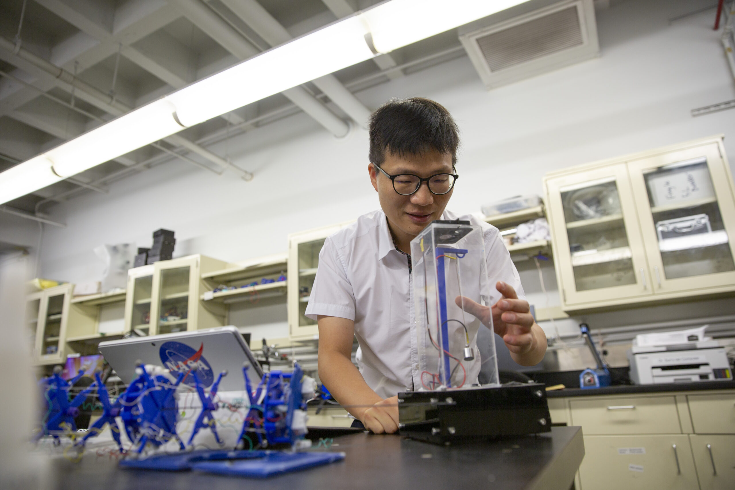 Jiefeng Sun, an assistant professor of aerospace and mechanical engineering in the School for Engineering of Matter, Transport and Energy, part of the Ira A. Fulton Schools of Engineering at Arizona State University (pictured in his campus lab), has received a $375,000 National Science Foundation grant for research that could lead to products that sense their surroundings and adapt their form. Photographer: Erika Gronek/ASU
